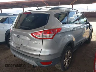 2013 Ford Escape SE with VIN 1FMCU0GX9DUB83512, listed as a IAAI auction lot 41970256 with 69,897 mi miles and . Bid and sale history available at DreamBid. Image 4.