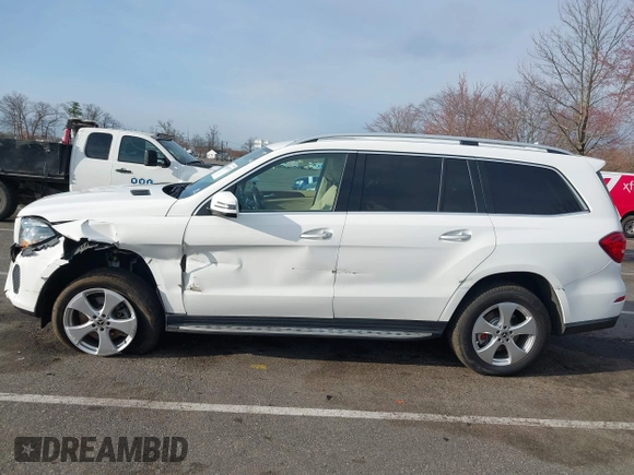 2019 Mercedes-Benz GLS 450 with VIN 4JGDF6EE3KB233297, listed as a IAAI auction lot 41882975 with 130,354 mi miles and . Bid and sale history available at DreamBid. Image 14.