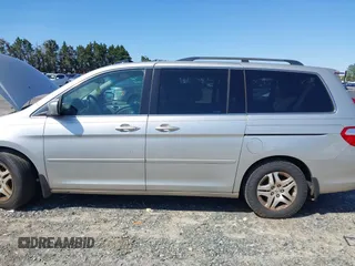 2007 Honda Odyssey EX-L with VIN 5FNRL387X7B080906, listed as a IAAI auction lot 41910061 with 229,717 mi miles and . Bid and sale history available at DreamBid. Image 14.