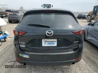 2021 Mazda CX-5 Grand Touring with VIN JM3KFBDM6M0401517, listed as a Copart auction lot 51019645 with 55,906 mi miles and Salvage Title. Bid and sale history available at DreamBid. Image 6.