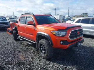 2016 Toyota Tacoma SR with VIN 3TMCZ5AN9GM014304, listed as a IAAI auction lot 41902497 with 106,214 mi miles and . Bid and sale history available at DreamBid. Image 1.
