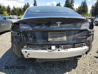 2020 Tesla Model 3 Long Range z VIN 5YJ3E1EBXLF795689, wystawiony jako Copart lot #56703555 z przebiegiem 62 556 mil mil oraz Szkoda całkowita • Salvage title. Historia ofert i sprzedaży dostępna na DreamBid. Obrazek 6.