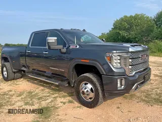 2020 GMC Sierra 3500HD Denali z VIN 1GT49WEY6LF205347, wystawiony jako Copart lot #59808195 z przebiegiem 262 762 mil mil oraz Czysty tytuł • Clean title. Historia ofert i sprzedaży dostępna na DreamBid. Obrazek 1.