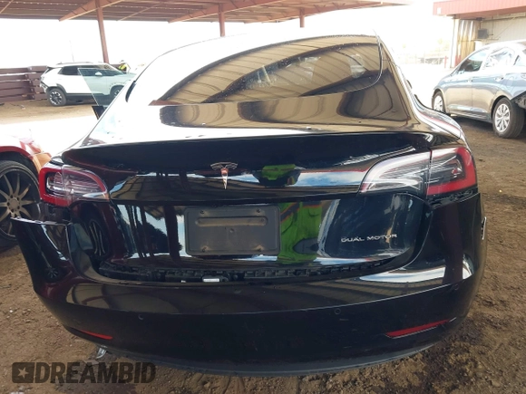2022 Tesla Model 3 Long Range with VIN 5YJ3E1EB3NF257077, listed as a IAAI auction lot 42086629 with Not Provided miles and . Bid and sale history available at DreamBid. Image 6.