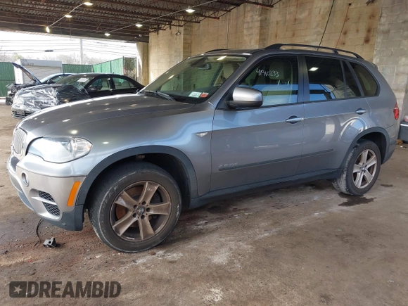 2012 BMW X5 35d with VIN 5UXZW0C59CL673416, listed as a IAAI auction lot 41910233 with 70,008 mi miles and . Bid and sale history available at DreamBid. Image 17.