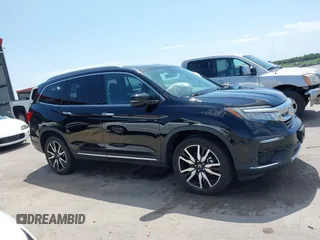 2019 Honda Pilot Touring 7-Passenger with VIN 5FNYF6H67KB031988, listed as a IAAI auction lot 42519588 with 41,368 mi miles and . Bid and sale history available at DreamBid. Image 13.