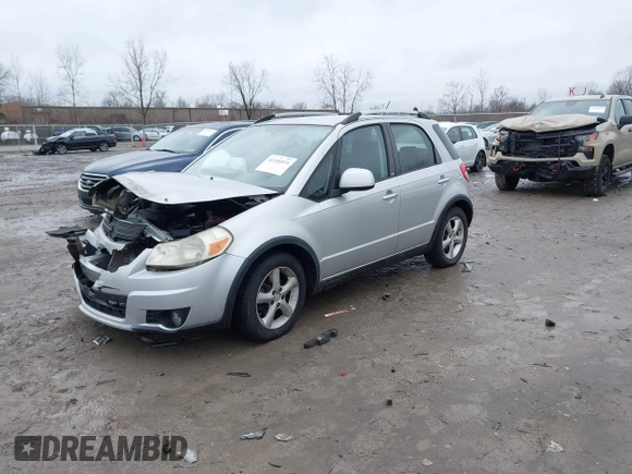 2007 Suzuki SX4 Man Touring Pkg AWD with VIN JS2YB417475102405, listed as a IAAI auction lot 41106931 with 170,315 mi miles. Bid and sale history available at carsss.com. Image 2.