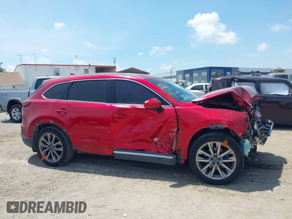 2019 Mazda CX-9 Grand Touring z VIN JM3TCADY5K0302436, wystawiony jako IAAI lot #42323545 z przebiegiem Nie podano mil oraz . Historia ofert i sprzedaży dostępna na DreamBid. Obrazek 13.