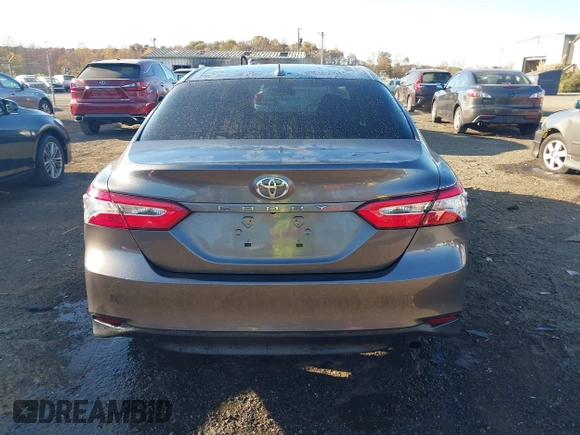 2020 Toyota Camry LE with VIN 4T1C11AKXLU884764, listed as a IAAI auction lot 40821088 with 111,631 mi miles. Bid and sale history available at carsss.com. Image 16.