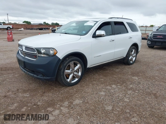 2013 Dodge Durango Citadel with VIN 1C4RDHEG2DC672632, listed as a IAAI auction lot 42432340 with 246,901 mi miles and . Bid and sale history available at DreamBid. Image 2.