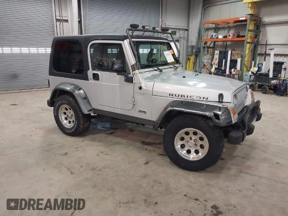 2003 Jeep Wrangler Rubicon with VIN 1J4FA69S13P375142, listed as a IAAI auction lot 41709647 with 125,443 mi miles and . Bid and sale history available at DreamBid. Image 1.