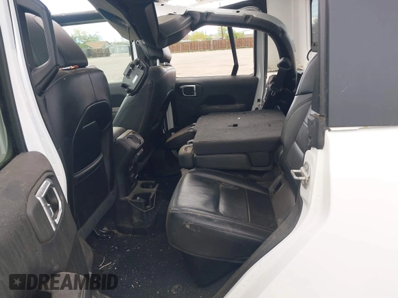 2021 Jeep Gladiator High Altitude with VIN 1C6HJTFG2ML567988, listed as a IAAI auction lot 42103576 with 74,849 mi miles and . Bid and sale history available at DreamBid. Image 8.