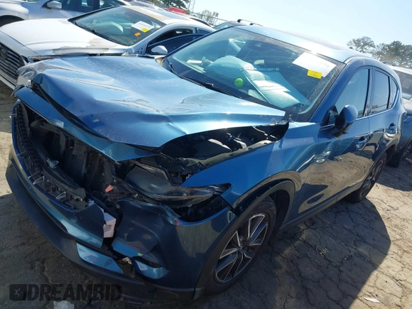 2017 Mazda CX-5 Grand Touring with VIN JM3KFADL8H0105518, listed as a IAAI auction lot 41876779 with 82,540 mi miles. Bid and sale history available at carsss.com. Image 17.