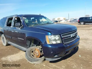 2009 Chevrolet Suburban LS with VIN 1GNFC16029R200974, listed as a IAAI auction lot 41370873 with 207,649 mi miles. Bid and sale history available at carsss.com. Image 6.