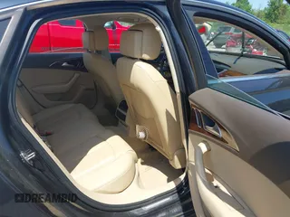 2014 Audi A6 Premium Plus z VIN WAUFGAFC1EN068005, wystawiony jako IAAI lot #42577265 z przebiegiem 109 947 mil mil oraz . Historia ofert i sprzedaży dostępna na DreamBid. Obrazek 8.