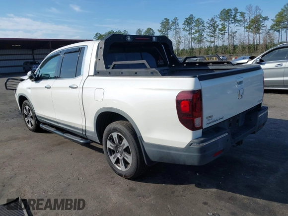 2018 Honda Ridgeline RTL-E with VIN 5FPYK3F71JB001753, listed as a IAAI auction lot 41510248 with 84,551 mi miles and . Bid and sale history available at DreamBid. Image 3.