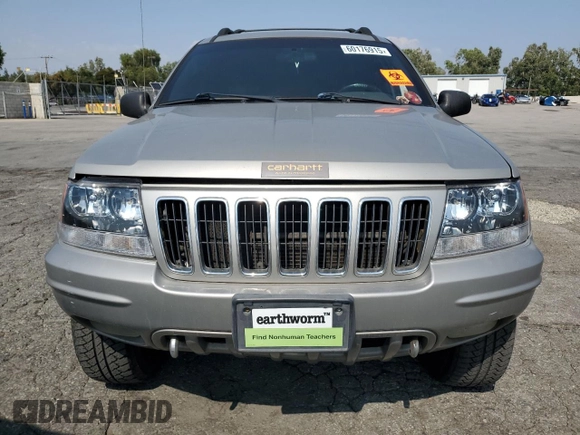 2001 Jeep Grand Cherokee Limited with VIN 1J4GW58N11C721108, listed as a Copart auction lot 60176915 with 257,907 mi miles and Salvage title. Bid and sale history available at DreamBid. Image 5.