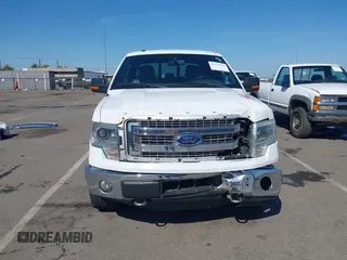2014 Ford F-150 XL with VIN 1FTFW1ET0EKE09435, listed as a IAAI auction lot 42128541 with 114,008 mi miles and . Bid and sale history available at DreamBid. Image 13.