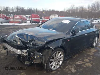 2013 Audi A7 Prestige with VIN WAU2GAFC1DN142732, listed as a IAAI auction lot 41396761 with 116,980 mi miles and . Bid and sale history available at DreamBid. Image 2.