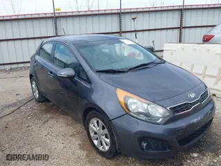 2013 Kia Rio SX with VIN KNADN5A39D6302606, listed as a IAAI auction lot 41790644 with 145,872 mi miles. Bid and sale history available at carsss.com. Image 1.