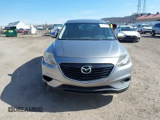 2015 Mazda CX-9 Sport with VIN JM3TB2BA6F0455539, listed as a IAAI auction lot 41839466 with 143,667 mi miles and . Bid and sale history available at carsss.com. Image 13.