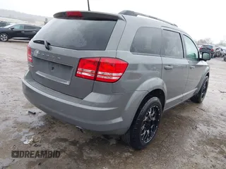 2019 Dodge Journey SE Value with VIN 3C4PDCAB5KT866156, listed as a IAAI auction lot 41910368 with 123,025 mi miles and . Bid and sale history available at DreamBid. Image 4.