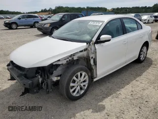 2014 Volkswagen Jetta SE с VIN 3VWD17AJ2EM391314, выставлен на аукционе Copart как лот 57357575 с пробегом 131 968 миль миль и Списание • Salvage title. История ставок и продаж доступна на DreamBid. Изображение 1.