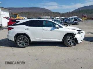2016 Lexus RX 450h with VIN 2T2BGMCAXGC004844, listed as a IAAI auction lot 41791066 with 100,604 mi miles and . Bid and sale history available at DreamBid. Image 13.