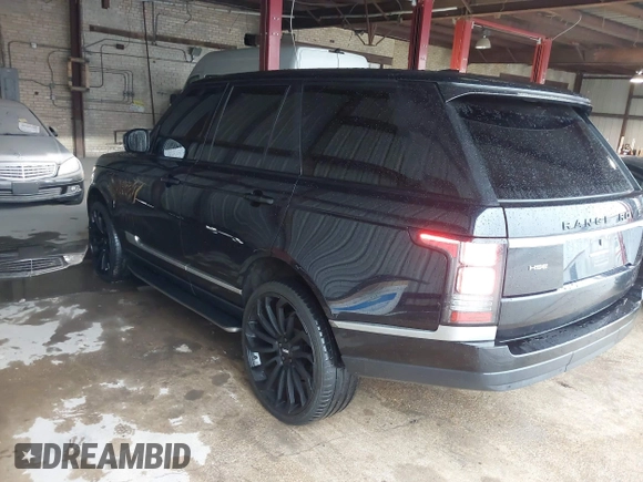 2014 Land Rover Range Rover HSE with VIN SALGS2WF0EA136283, listed as a IAAI auction lot 42161616 with 135,133 mi miles and . Bid and sale history available at DreamBid. Image 3.
