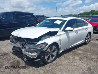 2019 Honda Accord Touring with VIN 1HGCV2F96KA015987, listed as a IAAI auction lot 42528744 with 174,735 mi miles and . Bid and sale history available at DreamBid. Image 2.