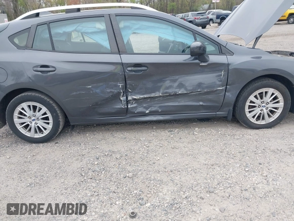 2018 Subaru Impreza Premium z VIN 4S3GTAD61J3703780, wystawiony jako IAAI lot #42081604 z przebiegiem 79 757 mil mil oraz . Historia ofert i sprzedaży dostępna na DreamBid. Obrazek 6.