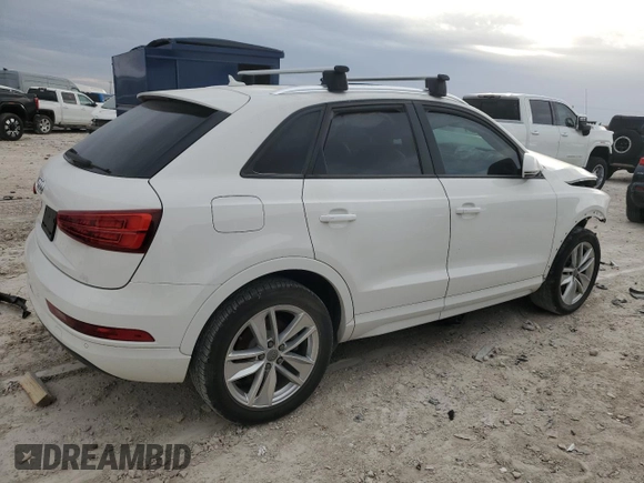 2017 Audi Q3 Premium z VIN WA1BCCFS0HR016968, wystawiony jako Copart lot #79358604 z przebiegiem Nie podano mil oraz Szkody całkowita. Historia ofert i sprzedaży dostępna na DreamBid. Obrazek 3.