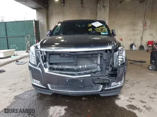 2017 Cadillac Escalade Premium Luxury with VIN 1GYS3CKJ0HR263565, listed as a IAAI auction lot 41615401 with 105,773 mi miles. Bid and sale history available at carsss.com. Image 13.