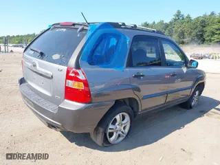 2008 Kia Sportage LX with VIN KNDJE723887542245, listed as a IAAI auction lot 40248690 with 122,558 mi miles. Bid and sale history available at carsss.com. Image 4.