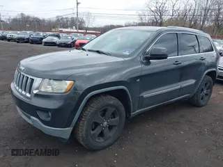 2011 Jeep Grand Cherokee Laredo with VIN 1J4RR4GGXBC597743, listed as a IAAI auction lot 41897286 with 253,111 mi miles and . Bid and sale history available at DreamBid. Image 2.
