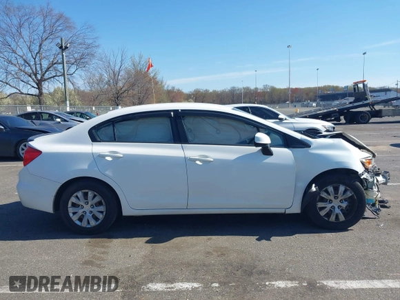 2012 Honda Civic LX with VIN 19XFB2F54CE348155, listed as a IAAI auction lot 42064540 with 238,636 mi miles and . Bid and sale history available at DreamBid. Image 13.