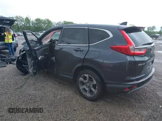 2018 Honda CR-V EX z VIN 7FARW2H50JE094132, wystawiony jako IAAI lot #42337889 z przebiegiem 59 273 mil mil oraz . Historia ofert i sprzedaży dostępna na DreamBid. Obrazek 3.