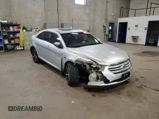 2015 Ford Taurus SEL z VIN 1FAHP2E85FG177576, wystawiony jako Copart lot #54739595 z przebiegiem 89 156 mil mil oraz Szkoda całkowita • Salvage title. Historia ofert i sprzedaży dostępna na DreamBid. Obrazek 13.
