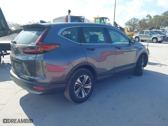 2020 Honda CR-V LX with VIN 7FARW1H29LE009775, listed as a IAAI auction lot 41571693 with 60,794 mi miles. Bid and sale history available at carsss.com. Image 4.