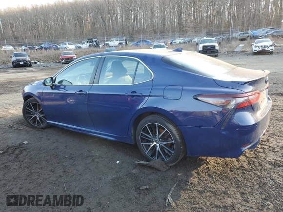 2023 Toyota Camry SE with VIN 4T1S11AK2PU096885, listed as a Copart auction lot 46437025 with 129,673 mi miles and Salvage Title. Bid and sale history available at DreamBid. Image 2.