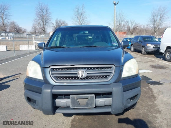 2003 Honda Pilot EX with VIN 2HKYF18503H610799, listed as a IAAI auction lot 41528867 with 323,810 mi miles. Bid and sale history available at carsss.com. Image 12.
