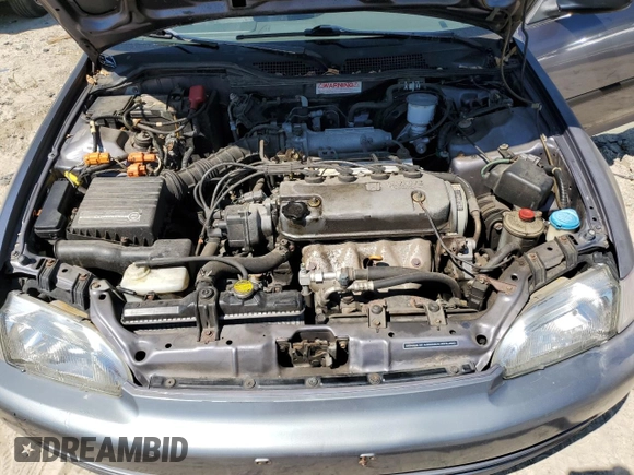 1995 Honda Civic LX z VIN 1HGEG8665SL054389, wystawiony jako Copart lot #70983094 z przebiegiem 195 047 mil mil oraz Szkoda całkowita • Salvage title. Historia ofert i sprzedaży dostępna na DreamBid. Obrazek 13.