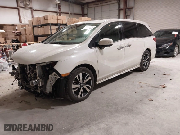 2018 Honda Odyssey Elite with VIN 5FNRL6H94JB034739, listed as a IAAI auction lot 41242506 with 96,982 mi miles and . Bid and sale history available at DreamBid. Image 18.
