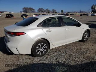 2021 Toyota Corolla Hybrid LE with VIN JTDEAMDE2MJ021576, listed as a Copart auction lot 49916105 with 24,292 mi miles and Salvage Title. Bid and sale history available at carsss.com. Image 3.