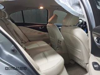 2015 Infiniti Q50 Premium z VIN JN1BV7AP6FM337369, wystawiony jako IAAI lot #41788419 z przebiegiem 106 977 mil mil oraz . Historia ofert i sprzedaży dostępna na DreamBid. Obrazek 8.