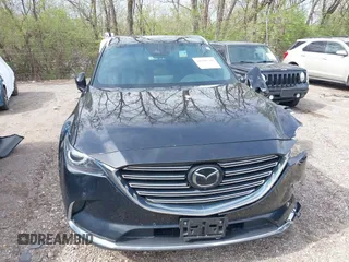 2020 Mazda CX-9 Grand Touring with VIN JM3TCBDY3L0419049, listed as a IAAI auction lot 41948393 with 70,163 mi miles and . Bid and sale history available at DreamBid. Image 12.