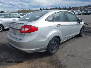 2011 Ford Fiesta SE with VIN 3FADP4BJ8BM216789, listed as a IAAI auction lot 41843080 with 95,424 mi miles. Bid and sale history available at carsss.com. Image 4.