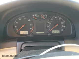 1999 Volkswagen Passat GLS with VIN WVWPD63B5XE497918, listed as a Copart auction lot 75795044 with 121,229 mi miles and Salvage Title. Bid and sale history available at carsss.com. Image 9.