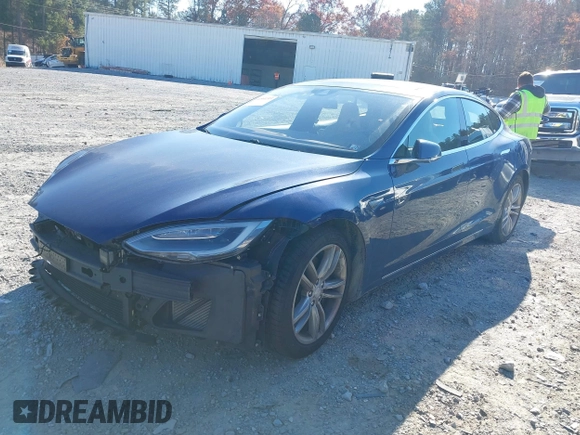2016 Tesla Model S 90D with VIN 5YJSA1E25GF144614, listed as a IAAI auction lot 40941311 with 83,587 mi miles and . Bid and sale history available at DreamBid. Image 13.
