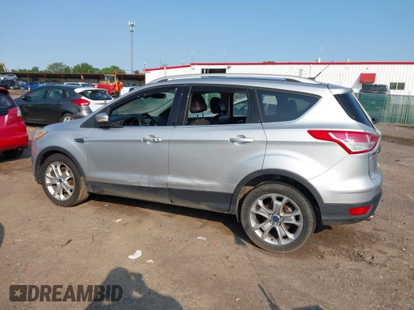 2015 Ford Escape Titanium z VIN 1FMCU0J90FUC02039, wystawiony jako IAAI lot #42369882 z przebiegiem 156 287 mil mil oraz . Historia ofert i sprzedaży dostępna na DreamBid. Obrazek 13.